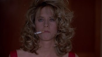 Movie still from “Flesh and Bone” (1993), directed by Steve Kloves – A person smoking a cigarette; Close Up shot, Low angle