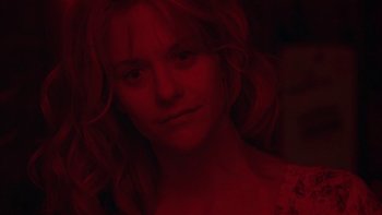 Movie still from “Flesh and Bone” (1993), directed by Steve Kloves – A person with long blonde hair; Close Up shot, Low angle