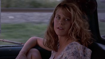 Movie still from “Flesh and Bone” (1993), directed by Steve Kloves – A person sitting in a chair; Close Up shot, Over the shoulder angle