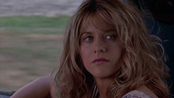 Movie still from “Flesh and Bone” (1993), directed by Steve Kloves – A person with long blonde hair; Close Up shot, Over the shoulder angle