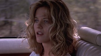 Movie still from “Flesh and Bone” (1993), directed by Steve Kloves – A person with long curly hair; Close Up shot, Over the shoulder angle