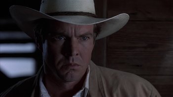Movie still from “Flesh and Bone” (1993), directed by Steve Kloves – A man wearing a cowboy hat; Close Up shot, Low angle