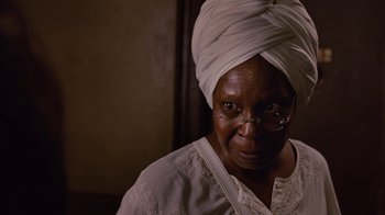 Movie still from “For Colored Girls” (2010), directed by Tyler Perry – An older woman wearing a white head scarf; Close Up shot, Low angle