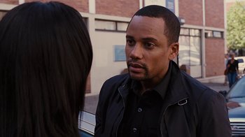 Movie still from “For Colored Girls” (2010), directed by Tyler Perry – A man and a woman talking to each other outside; Close Up shot, Over the shoulder angle