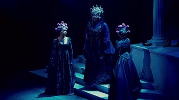 Movie still from “For Colored Girls” (2010), directed by Tyler Perry – A group of three women dressed up in costumes; Wide shot, High angle