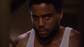 Movie still from “For Colored Girls” (2010), directed by Tyler Perry – A person wearing a tank top; Close Up shot, Low angle