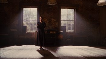 Movie still from “For Colored Girls” (2010), directed by Tyler Perry – A woman standing in the middle of an empty room; Wide shot, Low angle