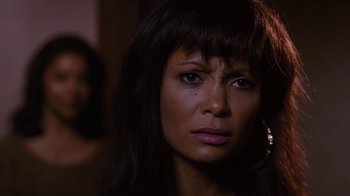 Movie still from “For Colored Girls” (2010), directed by Tyler Perry – A person with long black hair; Close Up shot, High angle