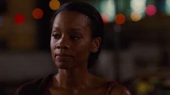 Movie still from “For Colored Girls” (2010), directed by Tyler Perry – A person wearing a brown shirt; Close Up shot, Over the shoulder angle