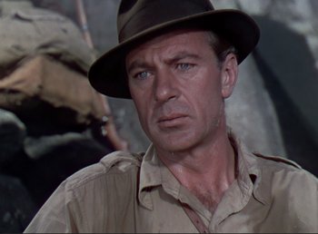 Movie still from “For Whom the Bell Tolls” (1943), directed by Sam Wood – A person wearing a hat; Close Up shot, Low angle