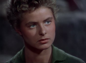 Movie still from “For Whom the Bell Tolls” (1943), directed by Sam Wood – A person wearing a green shirt; Close Up shot, High angle