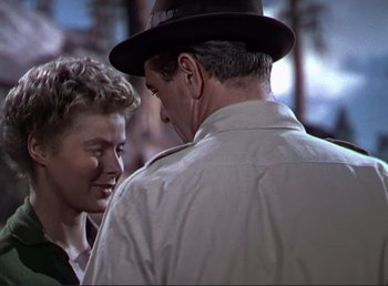 Movie still from “For Whom the Bell Tolls” (1943), directed by Sam Wood – A man and a woman talking to each other; Close Up shot, Over the shoulder angle