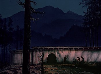 Movie still from “For Whom the Bell Tolls” (1943), directed by Sam Wood – A painting of a bridge at night with mountains in the background; Extreme Wide shot, Low angle