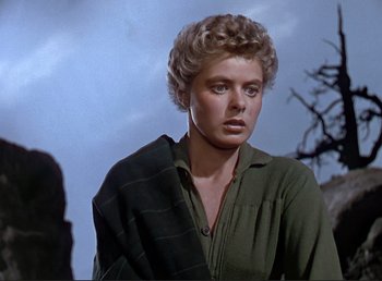 Movie still from “For Whom the Bell Tolls” (1943), directed by Sam Wood – A person wearing a green shirt; Close Up shot, Low angle