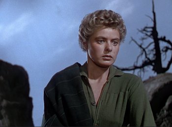 Movie still from “For Whom the Bell Tolls” (1943), directed by Sam Wood – A person wearing a green shirt; Close Up shot, Low angle