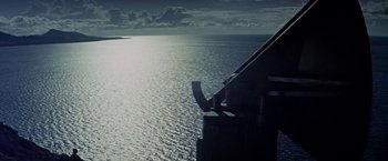 Movie still from “Force 10 from Navarone” (1978), directed by Guy Hamilton – A view of a body of water from a boat; Extreme Wide shot, High angle