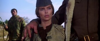 Movie still from “Force 10 from Navarone” (1978), directed by Guy Hamilton – A person wearing a hat; Close Up shot, Low angle