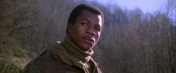 Movie still from “Force 10 from Navarone” (1978), directed by Guy Hamilton – A person wearing a jacket; Close Up shot, Low angle