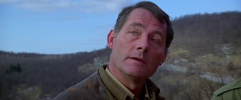 Movie still from “Force 10 from Navarone” (1978), directed by Guy Hamilton – A person wearing a jacket; Close Up shot, Low angle