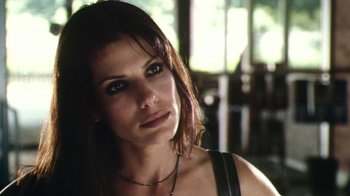 Movie still from “Forces of Nature” (1999), directed by Bronwen Hughes – A person wearing a necklace; Close Up shot, Over the shoulder angle