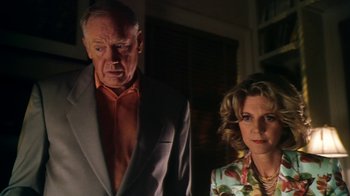 Movie still from “Forces of Nature” (1999), directed by Bronwen Hughes – An older man and a younger woman standing next to each other; Close Up shot, Low angle