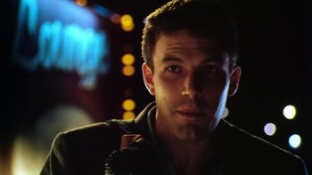 Movie still from “Forces of Nature” (1999), directed by Bronwen Hughes – A person wearing a jacket; Close Up shot, Low angle