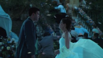 Movie still from “Forces of Nature” (1999), directed by Bronwen Hughes – A man and a woman standing next to each other; Medium shot, Low angle