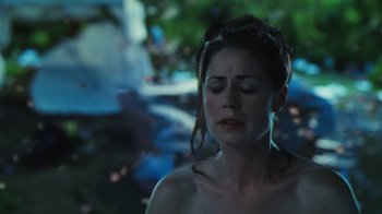 Movie still from “Forces of Nature” (1999), directed by Bronwen Hughes – A woman with her eyes closed and her hands on her face; Close Up shot, Over the shoulder angle