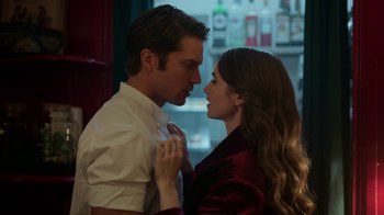 Movie still from “Emily in Paris” (2020), created by Darren Star – A man and a woman standing next to each other; Close Up shot, Over the shoulder angle