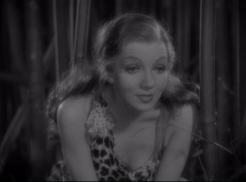 Movie still from “Four Frightened People” (1934), directed by Cecil B. DeMille – A black - and - white photo of a woman in a leopard print dress; Close Up shot, High angle