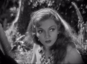 Movie still from “Four Frightened People” (1934), directed by Cecil B. DeMille – A black - and - white photo of a woman with long hair; Close Up shot, High angle