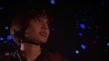 Movie still from “Foxfire” (1996), directed by Annette Haywood-Carter – A young man looking up into the sky; Close Up shot, Low angle