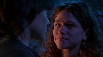 Movie still from “Foxfire” (1996), directed by Annette Haywood-Carter – A woman and a boy are looking at each other; Close Up shot, Over the shoulder angle