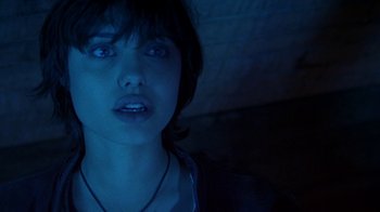 Movie still from “Foxfire” (1996), directed by Annette Haywood-Carter – A person wearing a necklace; Close Up shot, Over the shoulder angle