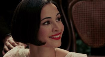 Movie still from “Frida” (2002), directed by Julie Taymor – A person wearing a necklace; Close Up shot, Over the shoulder angle