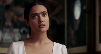 Movie still from “Frida” (2002), directed by Julie Taymor – A person wearing a white shirt; Close Up shot, Low angle