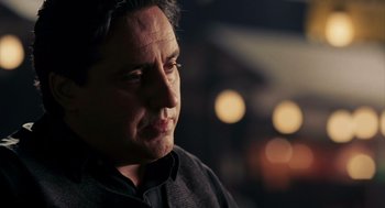 Movie still from “Frida” (2002), directed by Julie Taymor – A person wearing a black shirt; Close Up shot, Over the shoulder angle