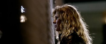 Movie still from “Friday Night Lights” (2004), directed by Peter Berg – A person with long hair; Close Up shot, Low angle