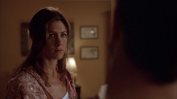 Movie still from “Friends with Money” (2006), directed by Nicole Holofcener – A person looking at a mirror; Close Up shot, Over the shoulder angle