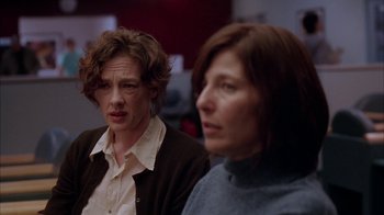 Movie still from “Friends with Money” (2006), directed by Nicole Holofcener – Two women sitting in front of each other in a room; Close Up shot, Over the shoulder angle