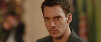Movie still from “From Paris with Love” (2010), directed by Pierre Morel – A man with a mustache; Close Up shot, Over the shoulder angle