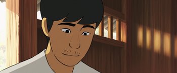 Movie still from “Funan” (2018), directed by Denis Do – An animated picture of a man with a black hair; Close Up shot, High angle
