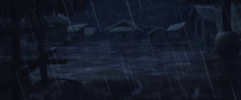 Movie still from “Funan” (2018), directed by Denis Do – A group of houses in the middle of the rain; Extreme Wide shot, High angle