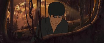 Movie still from “Funan” (2018), directed by Denis Do – An animated man in the woods looking sad; Close Up shot, High angle