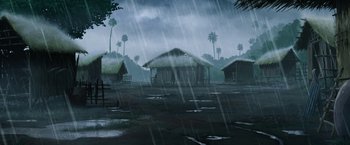 Movie still from “Funan” (2018), directed by Denis Do – An image of a rainy day in a village; Extreme Wide shot, High angle