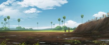 Movie still from “Funan” (2018), directed by Denis Do – Two people standing on a dirt field near trees; Extreme Wide shot, Low angle