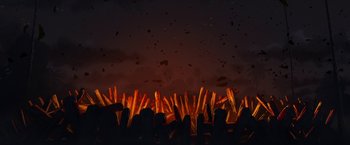 Movie still from “Funan” (2018), directed by Denis Do – A bunch of sticks that are in the dark; Extreme Wide shot, Low angle