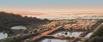 Movie still from “Funan” (2018), directed by Denis Do – An aerial view of a desert with palm trees and a lake; Extreme Wide shot, High angle
