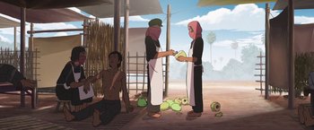 Movie still from “Funan” (2018), directed by Denis Do – Two people stand in front of a pile of fruit; Wide shot, High angle