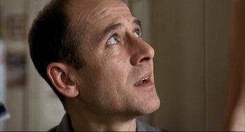 Movie still from “Funny Games” (1997), directed by Michael Haneke – A person looking up at something; Close Up shot, Low angle